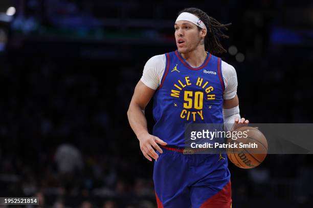 Aaron Gordon of the Denver Nuggets dribbles against the Washington Wizards during the first half at Capital One Arena on January 21, 2024 in...