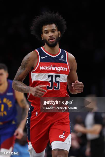 Marvin Bagley III of the Washington Wizards looks on against the Denver Nuggets during the first half at Capital One Arena on January 21, 2024 in...