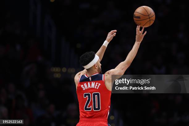 Landry Shamet of the Washington Wizards shoots against the Denver Nuggets during the first half at Capital One Arena on January 21, 2024 in...