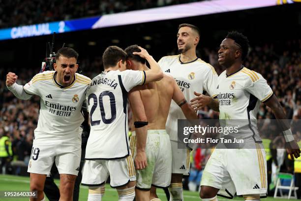 Daniel Carvajal of Real Madrid celebrates scoring his team's second goal with teammates ç during the LaLiga EA Sports match between Real Madrid CF...