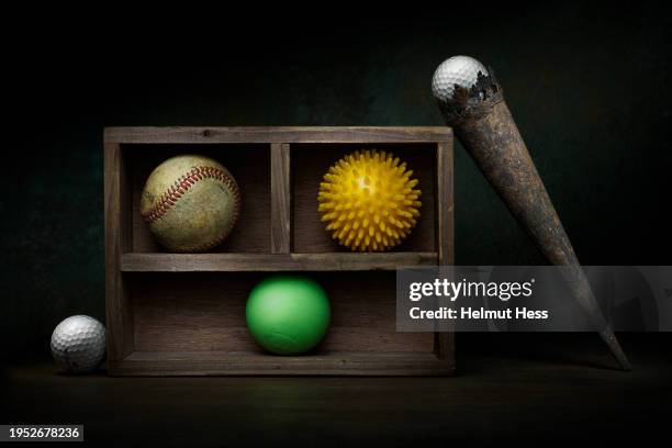 wooden box with balls - massage ball stock pictures, royalty-free photos & images