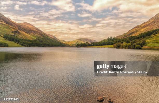 scenic view of lake against sky - renzo gherardi stock pictures, royalty-free photos & images