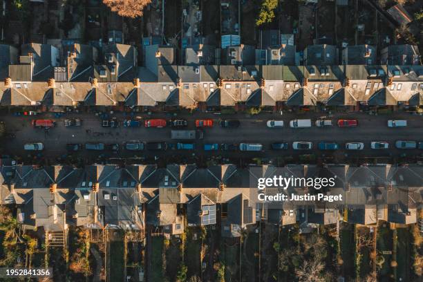 drone/aerial view over a street of victorian terraced houses in the uk - cambridge uk aerial stock pictures, royalty-free photos & images