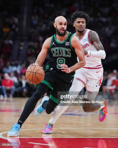 Derrick White of the Boston Celtics drives to the basket during the game against the Houston Rockets at Toyota Center on January 21, 2024 in Houston,...