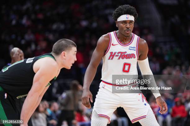 Aaron Holiday of the Houston Rockets looks on during the game against the Boston Celtics at Toyota Center on January 21, 2024 in Houston, Texas. NOTE...