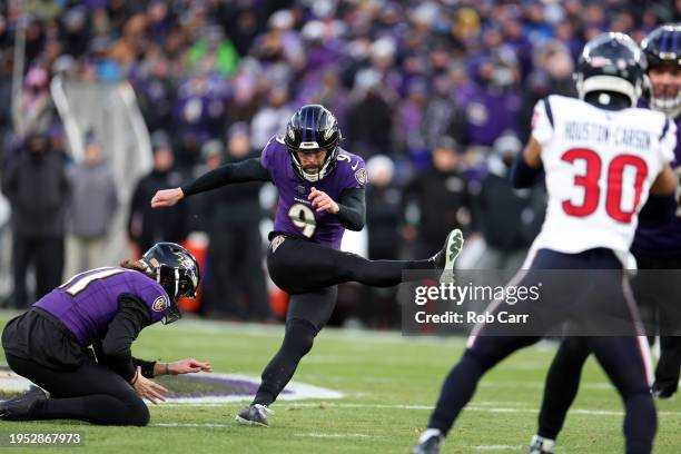 Place kicker Justin Tucker of the Baltimore Ravens kicks a first half field goal against the Houston Texans during the AFC Divisional Playoff game at...
