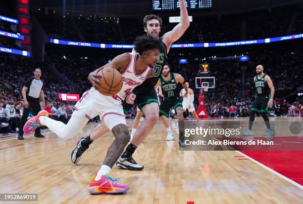 Jalen Green of the Houston Rockets dribbles the ball during the game against the Boston Celtics at Toyota Center on January 21, 2024 in Houston,...