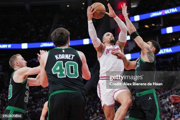 Dillon Brooks of the Houston Rockets goes up for a shot whilst being defended by Jayson Tatum of the Boston Celtics during the game at Toyota Center...