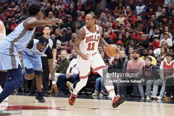 DeMar DeRozan of the Chicago Bulls controls the ball against the Memphis Grizzlies on January 20, 2024 at United Center in Chicago, Illinois. NOTE TO...