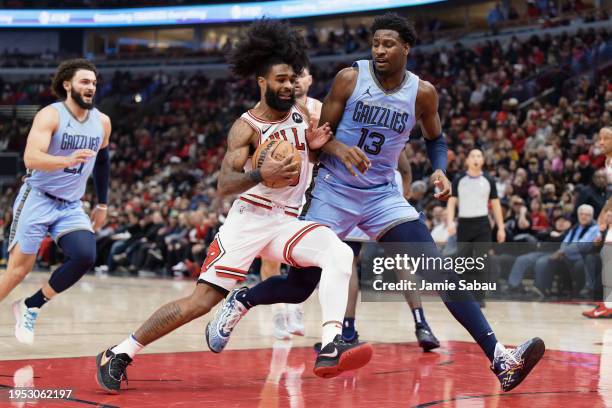 Coby White of the Chicago Bulls controls the ball against the Memphis Grizzlies on January 20, 2024 at United Center in Chicago, Illinois. NOTE TO...