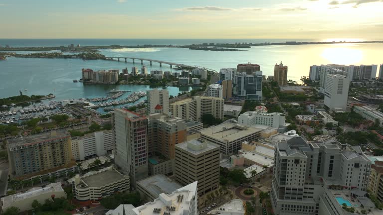https://media.gettyimages.com/id/1953089778/video/sarasota-city-florida-with-waterfront-office-highrise-buildings-development-of-housing-and.jpg?b=1&s=640x640&k=20&c=7-X3VsTm6DGQC4MCjH9rSRkjka6S8CRp7P_MMducNAE=