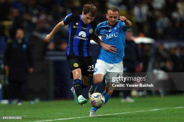 Nicolo Barella of FC Internazionale challenges for the ball with Stanislav Lobotka of SSC Napoli during the Italian EA Sports FC Supercup Final match...