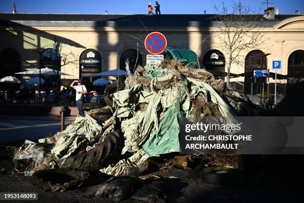 This photograph taken on January 25 shows a pile of debris in front of the Agen train station as farmers take part in a nation-wide day of actions...