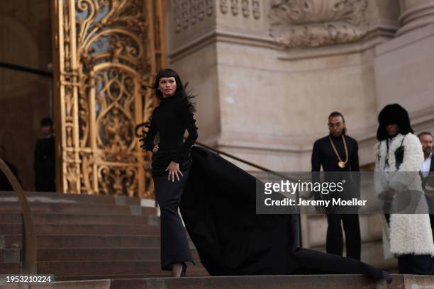 Zendaya is seen wearing a black long turtleneck sleek dress outside Schiaparelli Show during the Haute Couture Spring/ Summer 2024 as part of Paris...
