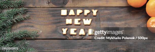 directly above shot of text on table - table font view stock pictures, royalty-free photos & images