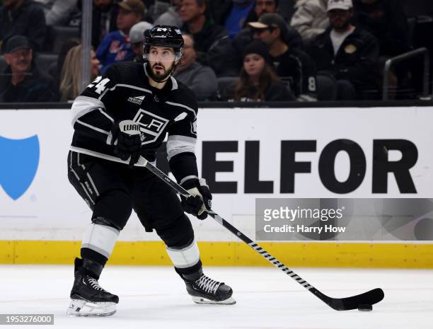 Phillip Danault of the Los Angeles Kings looks to pass during a 2-1 win over the New York Rangers at Crypto.com Arena on January 20, 2024 in Los...