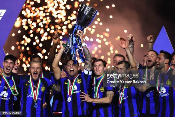 Lautaro Martinez of FC Internazionale lifts the Italian EA Sports FC Supercup Final trophy at full-time following victory in the Italian EA Sports FC...
