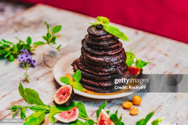 homemade protein chocolate pancakes - protein pancakes stock pictures, royalty-free photos & images