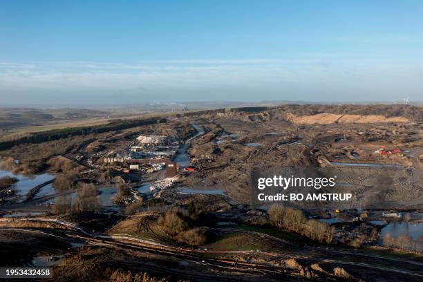 An aerial view taken on January 25, 2024 shows a site owned by Danish waste management service company Nordic Waste after a landslide of several...