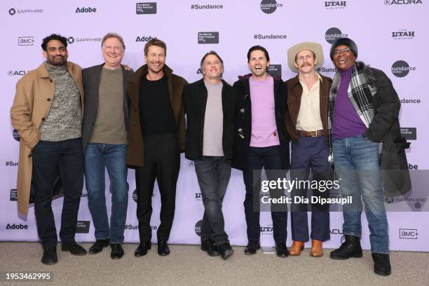 Sanjay Rao, Mike Blizzard, Glen Powell, Richard Linklater, Evan Holtzman, Austin Amelio, and Gralen Banks attend the "Hit Man" Premiere during the...