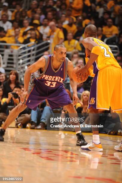 Kobe Bryant of the Los Angeles Lakers is defended by Grant Hill of the Phoenix Suns in Game One of the Western Conference Finals during the 2010 NBA...