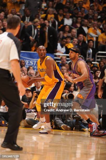 Kobe Bryant of the Los Angeles Lakers looks to make his move against Jared Dudley of the Phoenix Suns in Game One of the Western Conference Finals...