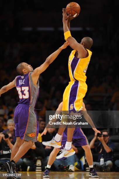 Kobe Bryant of the Los Angeles Lakers shoots against Grant Hill of the Phoenix Suns in Game One of the Western Conference Finals during the 2010 NBA...