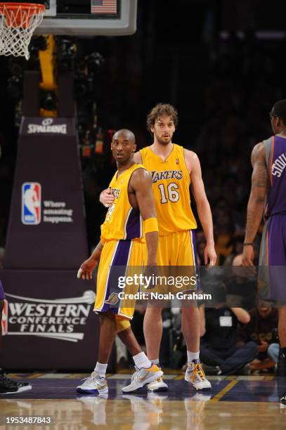Kobe Bryant and Pau Gasol of the Los Angeles Lakers looks on against the Phoenix Suns in Game One of the Western Conference Finals during the 2010...