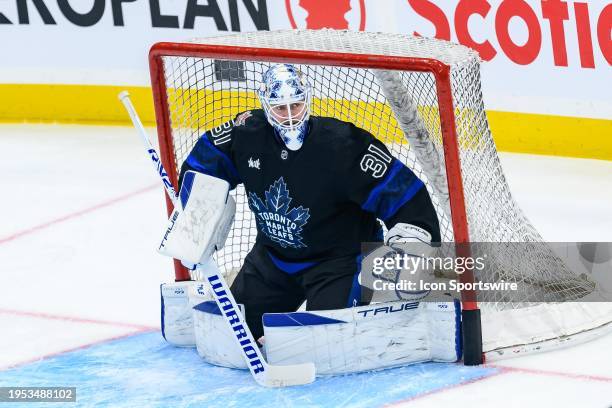 Toronto Maple Leafs Goalie Martin Jones tends the net during warmup before the NHL regular season game between the Winnipeg Jets and the Toronto...