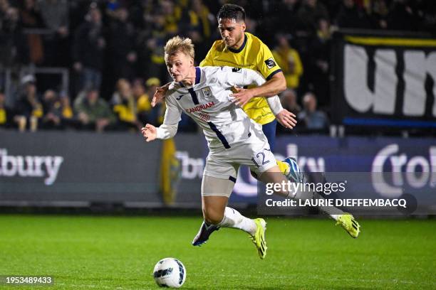 Anderlecht's Kasper Dolberg Rasmussen and Union's Kevin Mac Allister fight for the ball during a Croky Cup 1/4 final match between Royale Union...