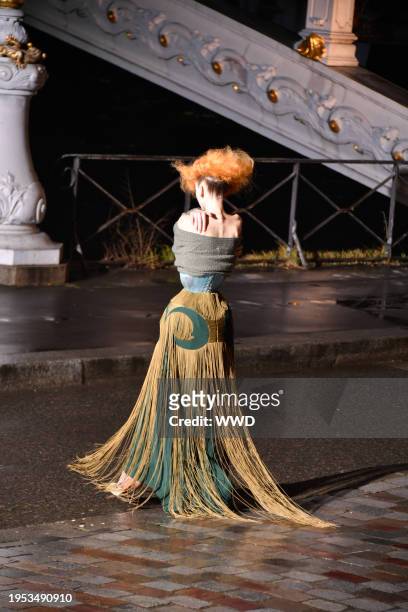 Model on the runway at Maison Margiela Couture Spring 2024 as part of Paris Couture Fashion Week held at Pont Alexandre III on January 25, 2024 in...