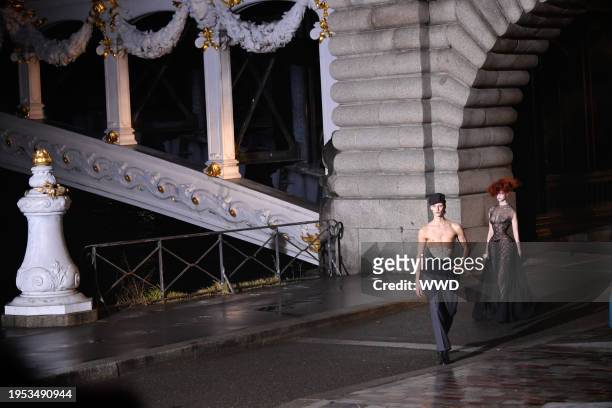 Model on the runway at Maison Margiela Couture Spring 2024 as part of Paris Couture Fashion Week held at Pont Alexandre III on January 25, 2024 in...