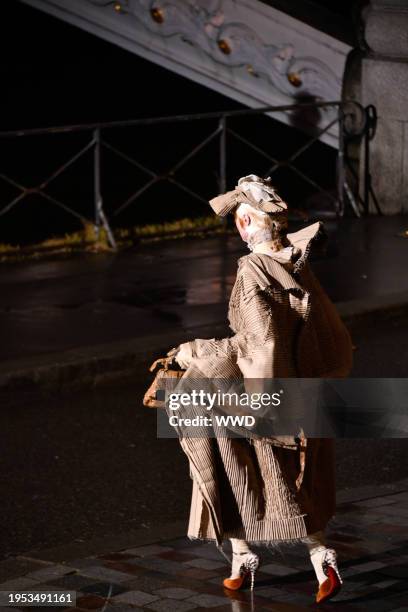 Model on the runway at Maison Margiela Couture Spring 2024 as part of Paris Couture Fashion Week held at Pont Alexandre III on January 25, 2024 in...