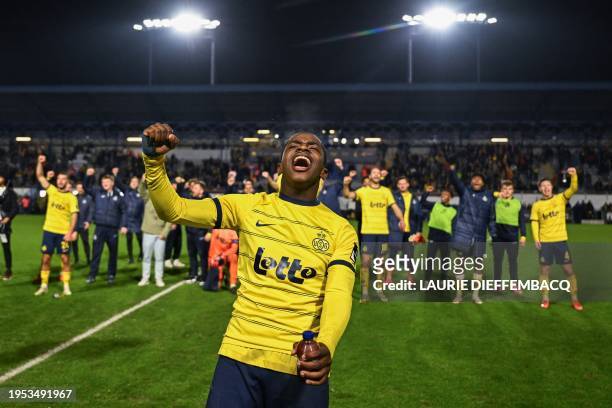 Union's Noah Sadiki celebrates after winning a Croky Cup 1/4 final match between Royale Union Saint-Gilloise and RSC Anderlecht, in Brussels,...