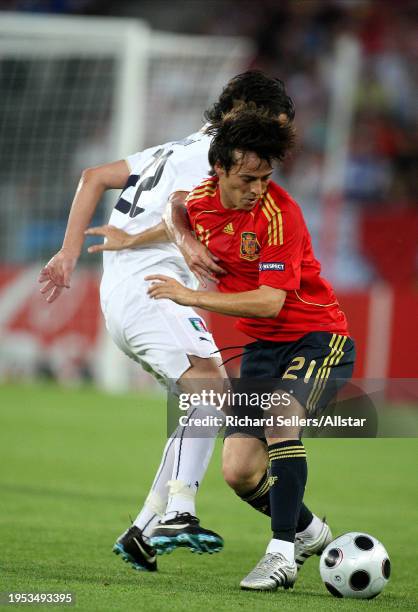 June 22: David Silva of Spain and Alberto Aguilani of Italy challenge during the UEFA Euro 2008 Quarter Final match between Spain and Italy at...