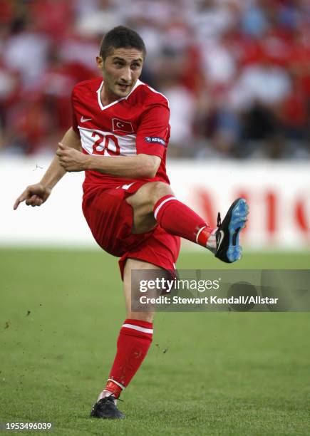 June 25: Sabri Sarioglu of Turkey kicking during the UEFA Euro 2008 Semi Final match between Germany and Turkey at St Jakob-park on June 25, 2008 in...