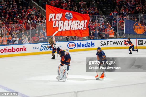 Calvin Pickard of the Edmonton Oilers salutes the crowd after defeating the Chicago Blackhawks at Rogers Place on January 25, 2024 in Edmonton,...