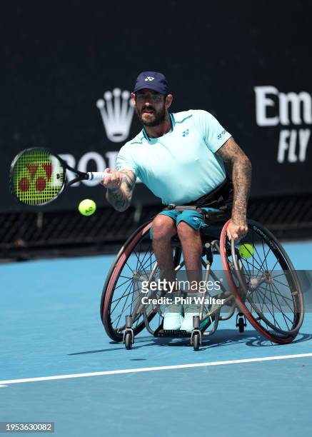 Heath Davidson of Australia plays a shot in their round one quad wheelchair singles match against Tomas Masaryk of Slovakia during the 2024...