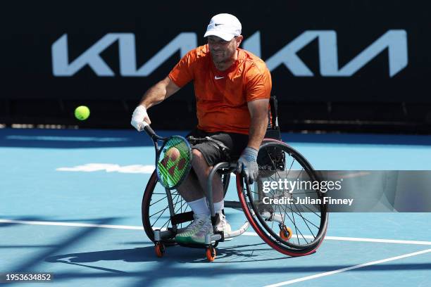 David Wagner of the United States plays a backhand in his Quad Wheelchair Singles match against Donald Ramphadi of South Africa during the 2024...
