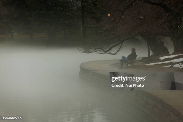 The Tidal Basin on the National Mall in Washington, D.C., is shrouded in dense fog on January 25, 2024.