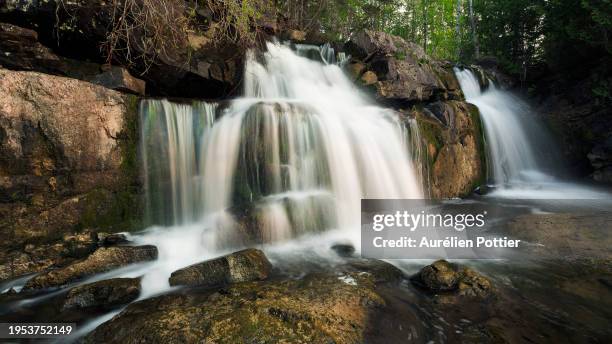 métis-sur-mer, cascade au printemps 2 - gaspe peninsula stock pictures, royalty-free photos & images