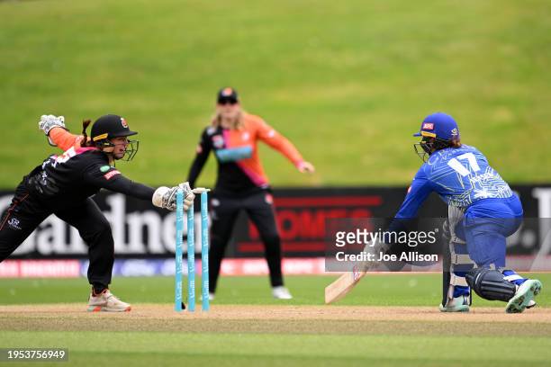 Hayley Jensen of the Sparks is run out by Holly Topp during the T20 Super Smash match between Otago Sparks and Northern Districts Brave at University...