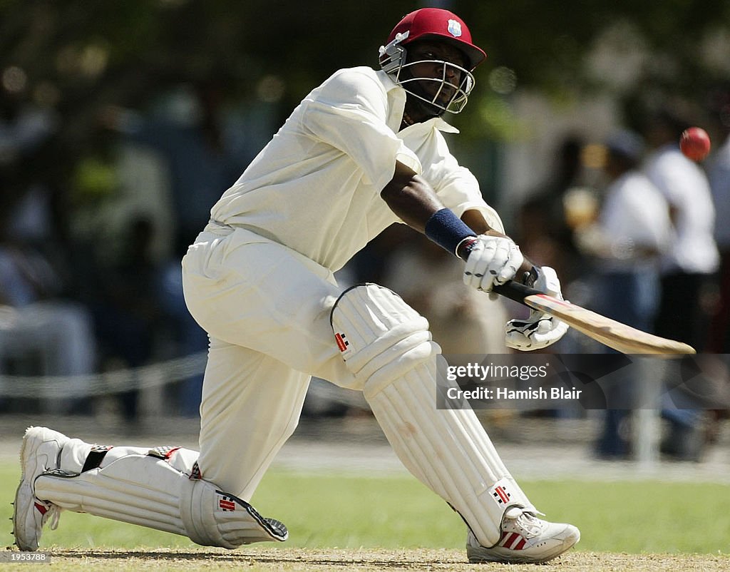 Chris Gayle of the University XI in action