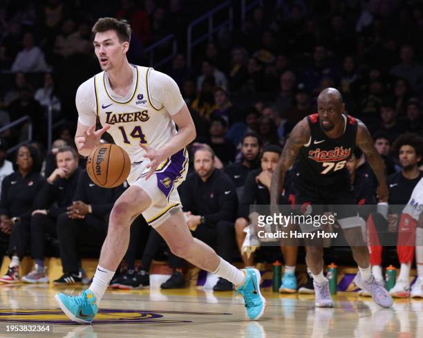 Colin Castleton of the Los Angeles Lakers drives to the basket during a 134-110 win over the Portland Trail Blazers at Crypto.com Arena on January...