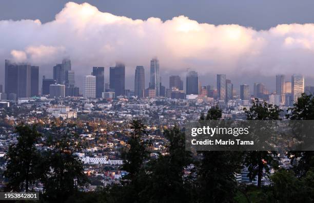 The downtown skyline is viewed during a clearing storm on January 22, 2024 in Los Angeles, California.