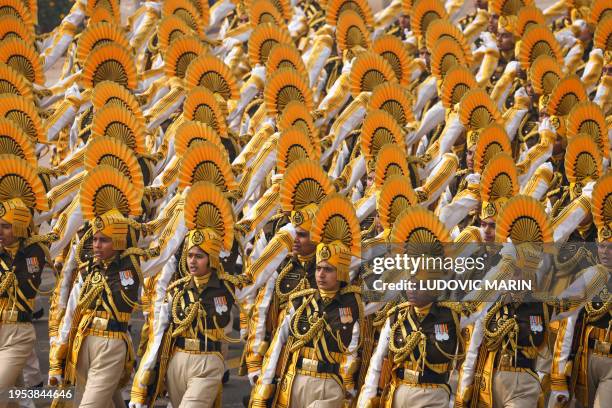 Indian soldiers march at the Republic Day parade in New Delhi on January 26, 2024. President Emmanuel Macron was guest of honour for India's...