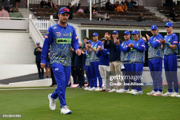 Hamish Rutherford of the Volts takes to the field in his last game before retirement during the T20 Super Smash match between Otago Sparks and...