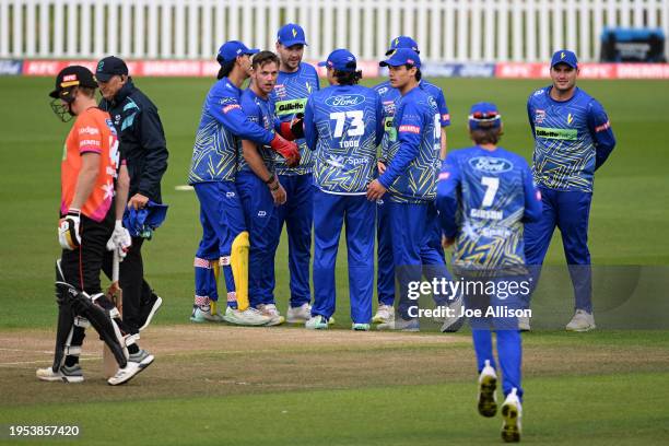 The Volts celebrate after dismissing Katene Clarke during the T20 Super Smash match between Otago Volts and Northern Districts Brave at University of...