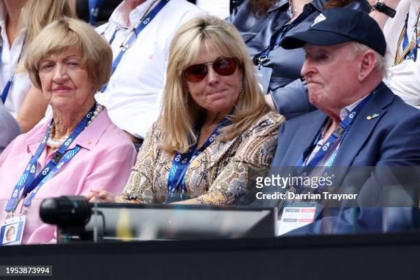 Margaret Court, Susan Johnson and Rod Laver look on during the quarterfinal singles match between Marta Kostyuk of Ukraine and Coco Gauff of the...