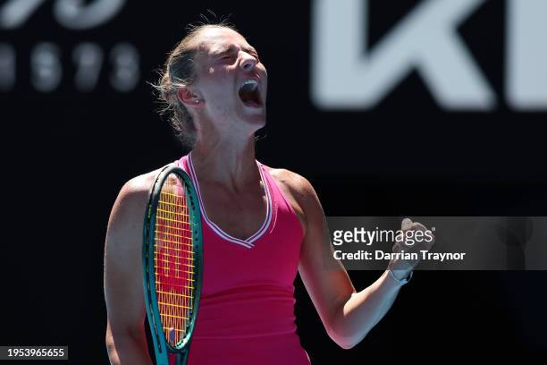 Marta Kostyuk of Ukraine celebrates winning the second set in their quarterfinals singles match against Coco Gauff of the United States during the...